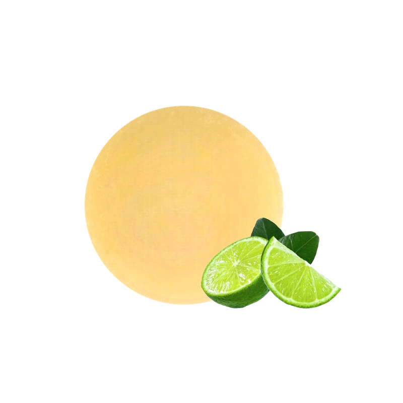 Puree chanh màu vàng nhạt đặt cạnh quả chanh xanh bổ đôi mọng nước